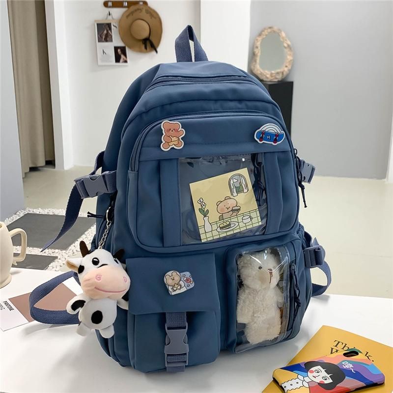 Junior high school student bag ins Korean version of the new primary school students cute Harajuku backpack fashion Oxford cloth backpack outdoor blue + bear + calf