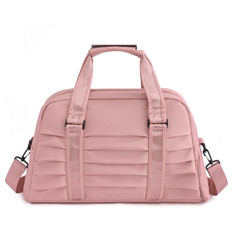 New pleated hand luggage bag large capacity short-distance travel bag wet and dry separation fitness bag swimming bag women's bag Pink