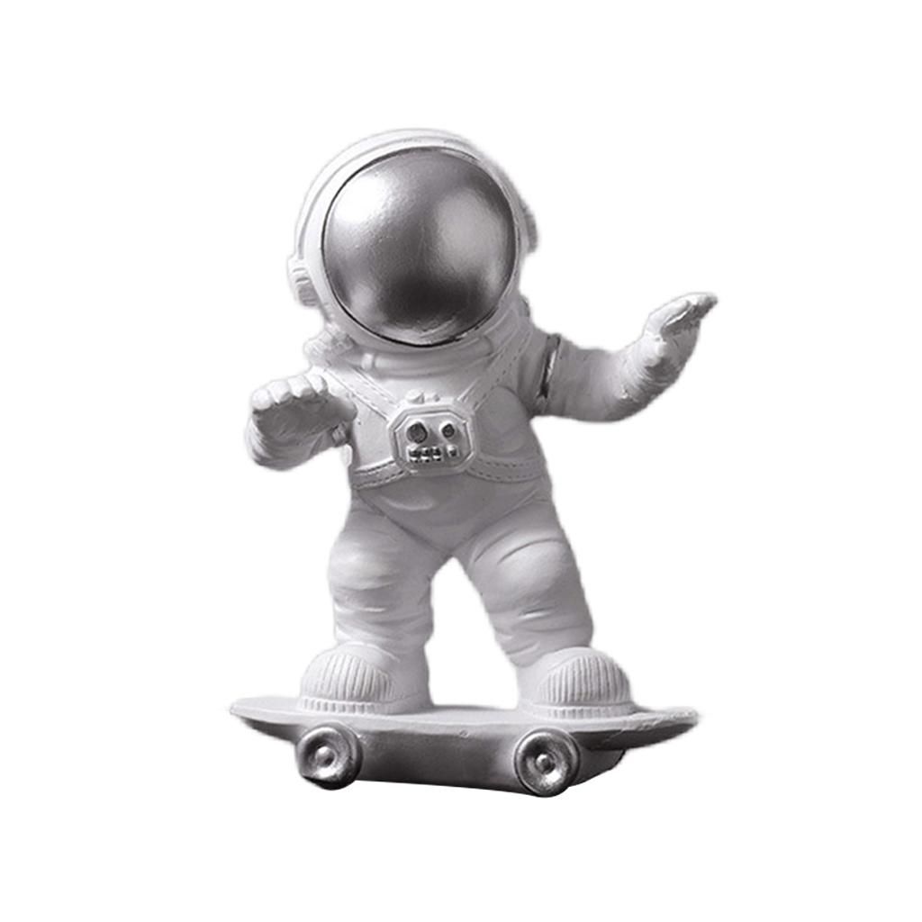Outer Space Astronaut Figures Resin Spaceman Skateboarding Silver