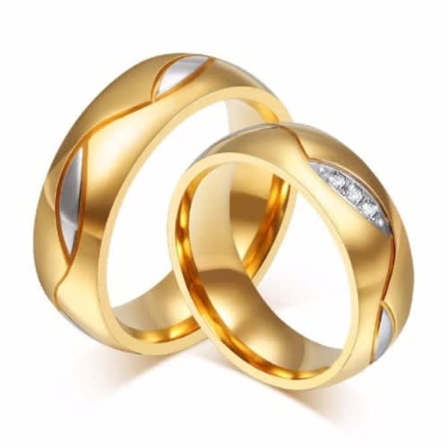 Couple Engagement And Wedding Rings