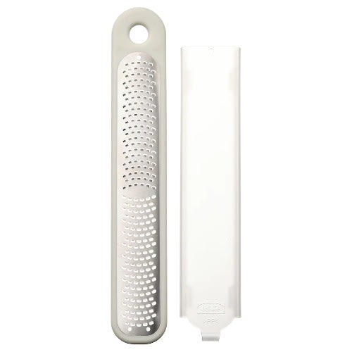 Uppfylld Handheld Grater