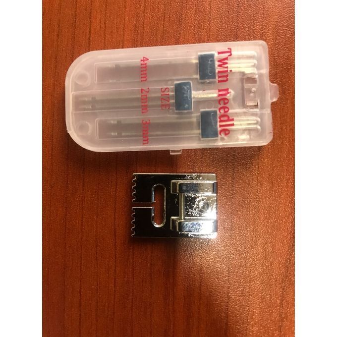 A Set Of Twin Needles With 9-Groove Pintuck Foot