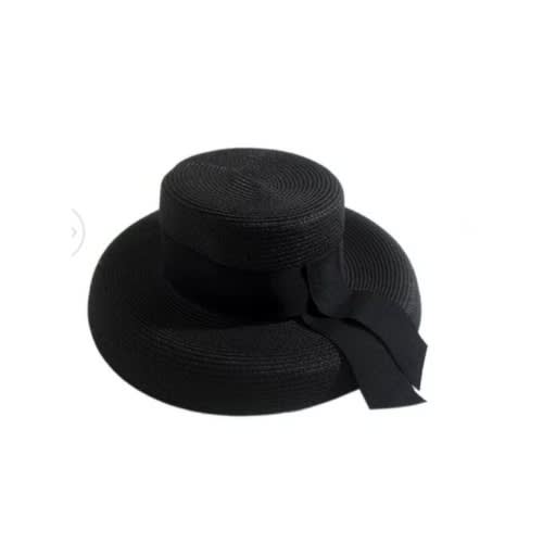 Ladies Wide Brim Floppy Straw Hat With A Tiny Ribbon Bow