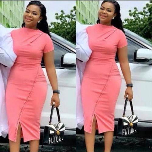 Beautiful Cooperate Fitted Gown Peach Colour.