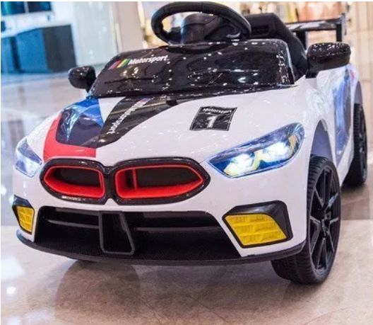 KIDDIES SPORT CAR WITH MUSIC