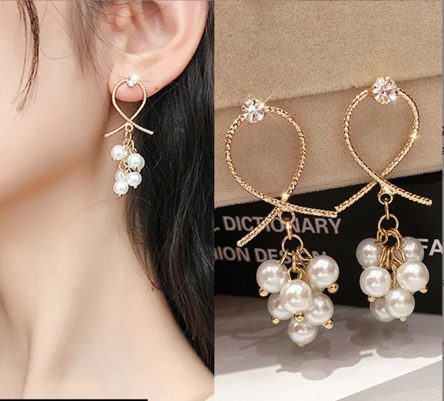 Opulent Silver Pearl Needle Earing