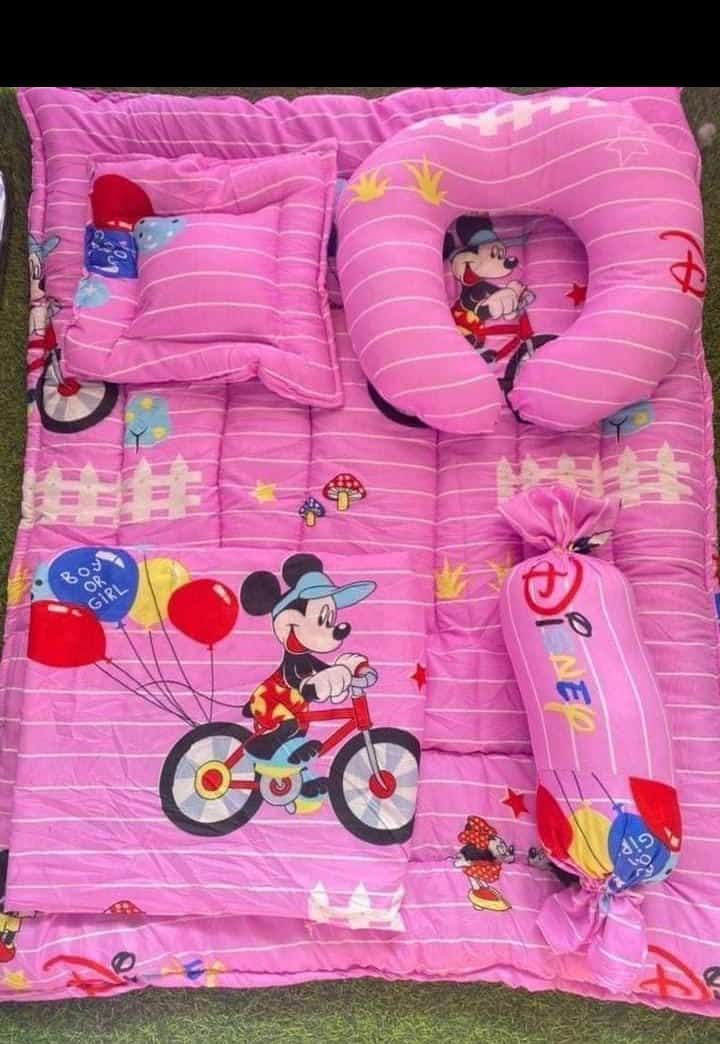 Baby Bed Pink With Fiber Pillows Four In One.