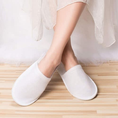 A Pair Of Indoor Spa Slippers