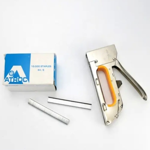 A Binder And A Packet Of Clip