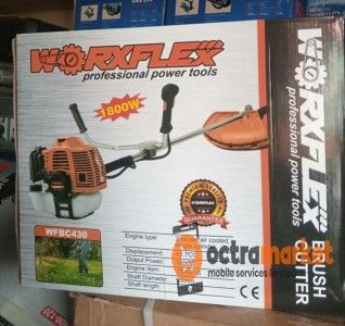 GASOLINE BRUSH CUTTER OR GRASS CUTTING MACHINE