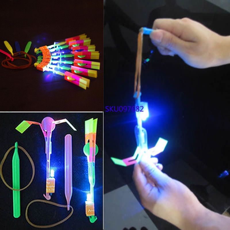 10PCS Pink LED Light Flying Sling Rocke Flyer Boomerangt Arrow Toys Gift