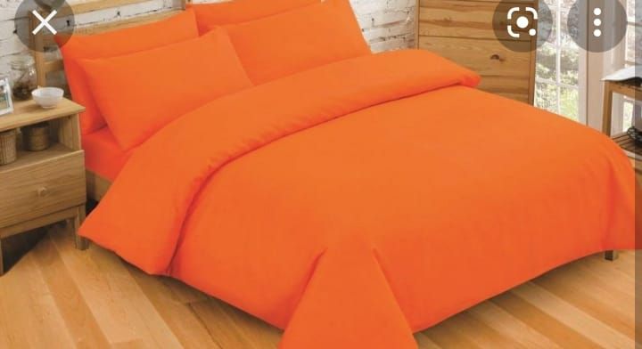 Plain Orange Bedsheet With 4 Pillows
