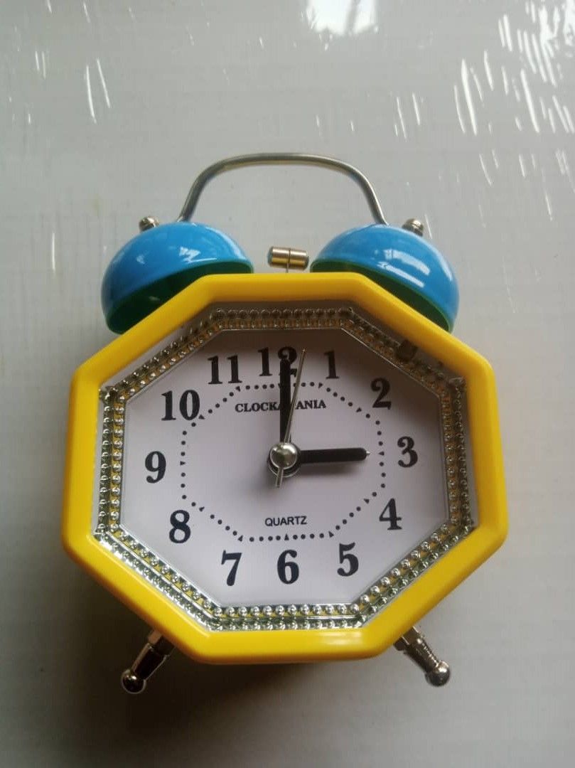 Yellow Octagonal Alarm Clock With Blue Double Bells